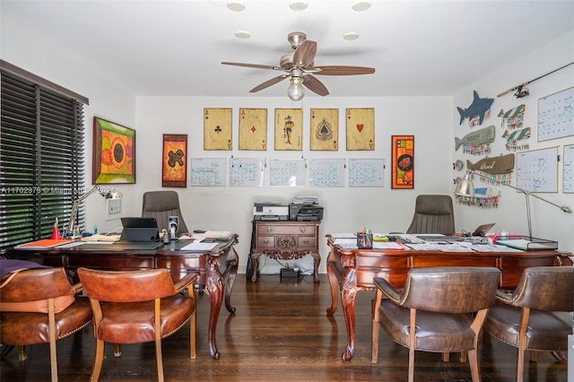 office area with ceiling fan and dark hardwood / wood-style floors