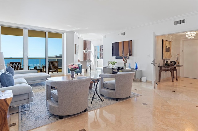 living room featuring a water view, a wall of windows, and crown molding