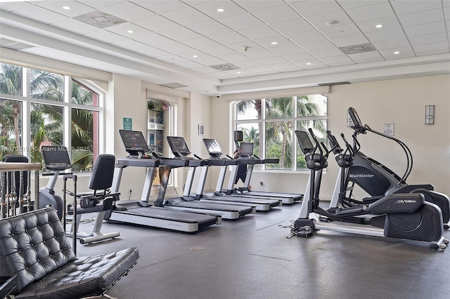 exercise room with a drop ceiling