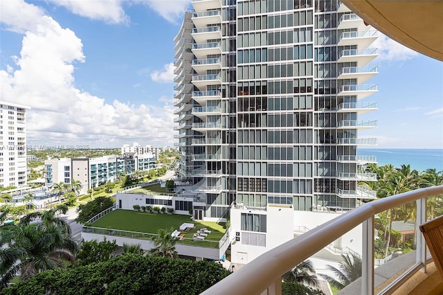 balcony featuring a water view