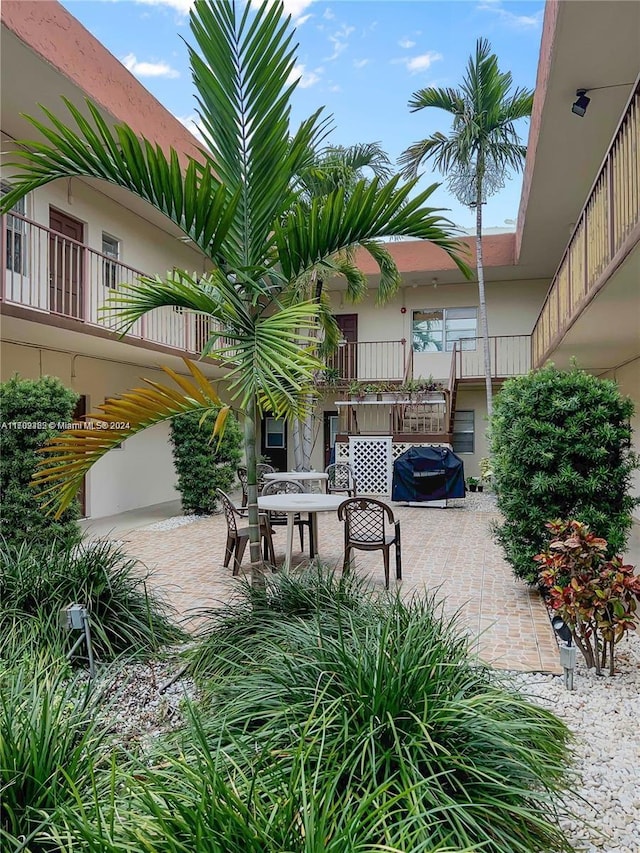 view of patio with a grill