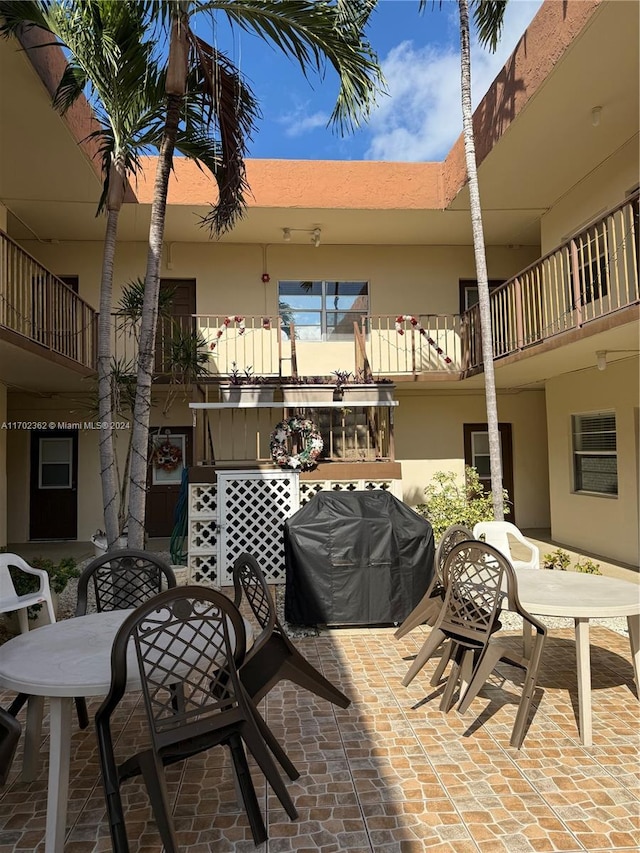 view of patio featuring a grill