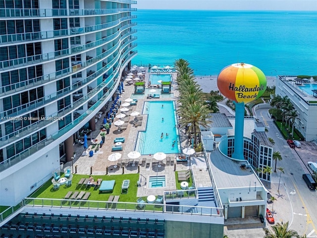 birds eye view of property featuring a water view