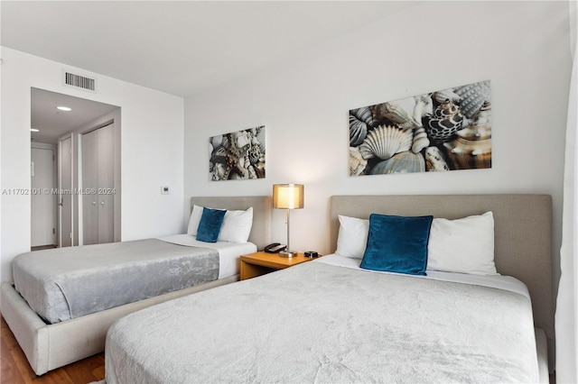 bedroom featuring hardwood / wood-style flooring