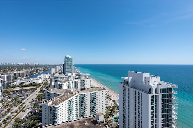 aerial view featuring a water view and a view of city