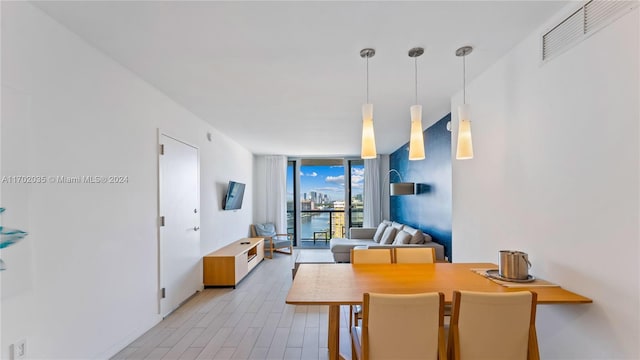 dining room featuring expansive windows