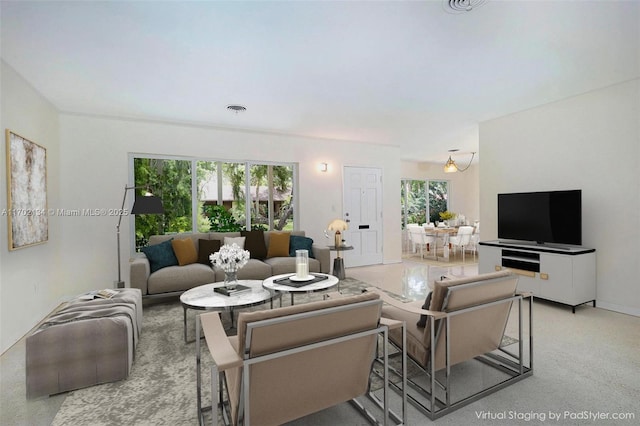 living room featuring plenty of natural light