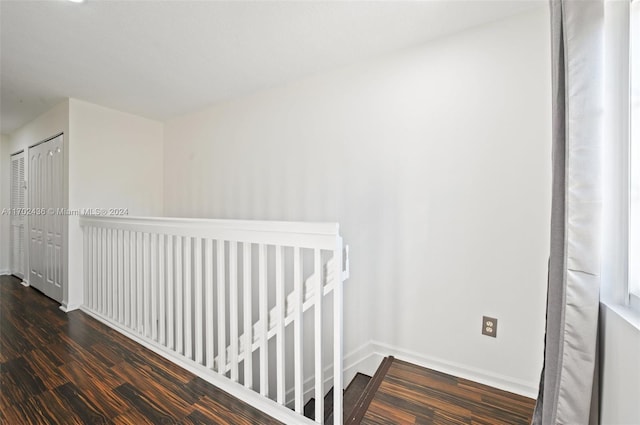 hall featuring dark hardwood / wood-style floors