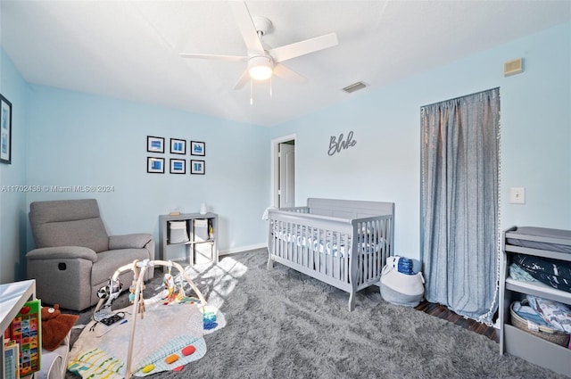 bedroom with carpet and ceiling fan