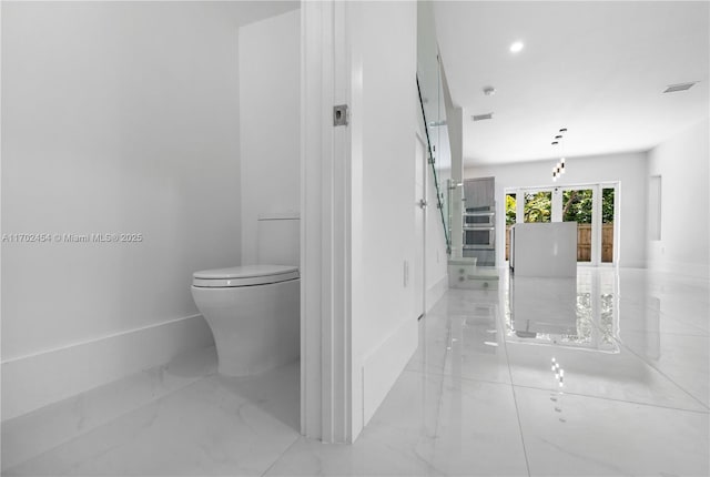 bathroom featuring toilet