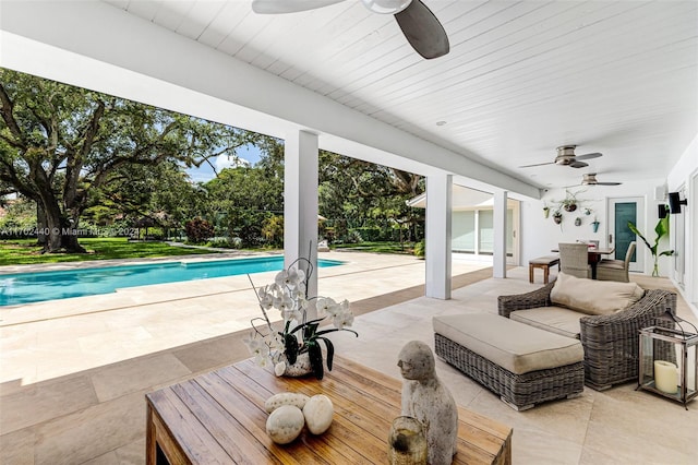 view of patio / terrace featuring ceiling fan and an outdoor hangout area