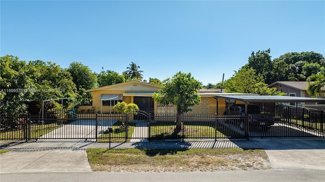 view of front of house with a carport