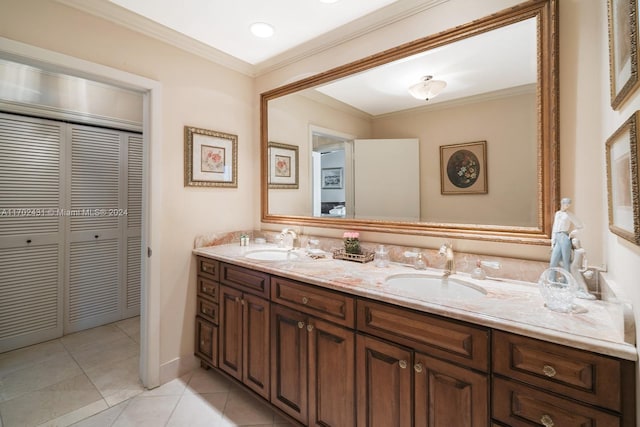 bathroom with tile patterned flooring, vanity, and ornamental molding