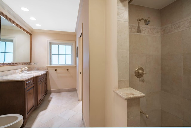 bathroom with tile patterned floors, tiled shower, a healthy amount of sunlight, and ornamental molding