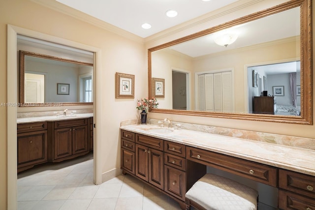 bathroom with vanity and crown molding