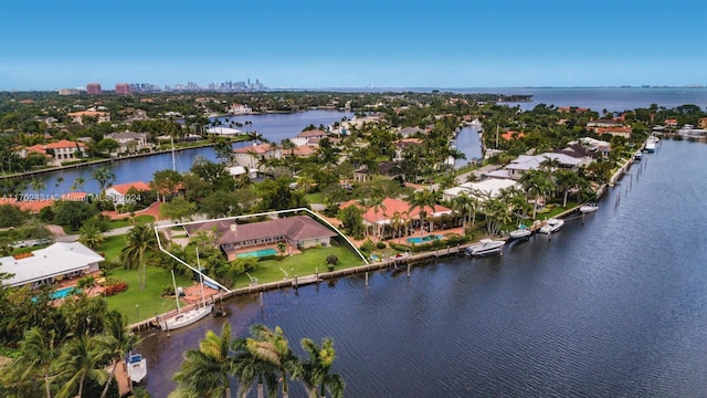 bird's eye view with a water view