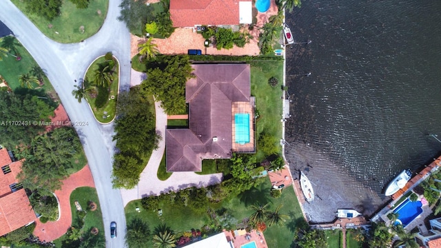 drone / aerial view with a water view