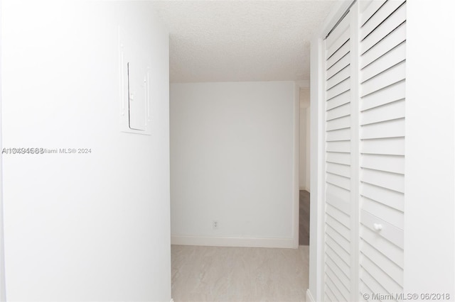 interior space with a textured ceiling