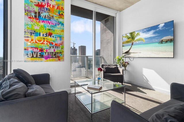 living room with a wall of windows