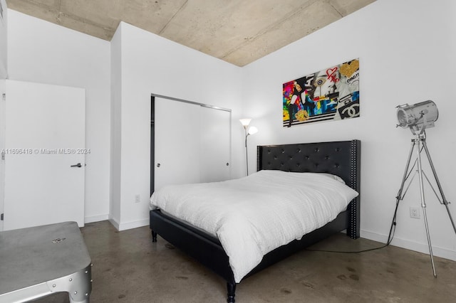 bedroom with concrete flooring