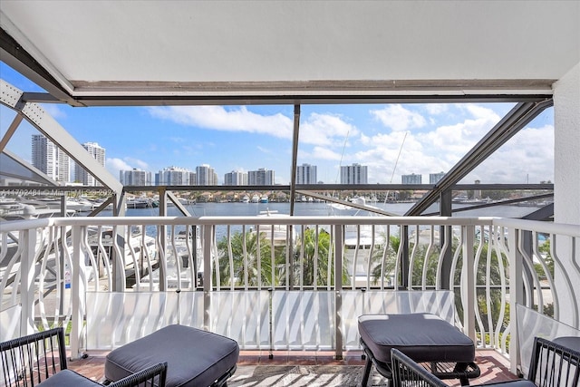 balcony featuring a water view