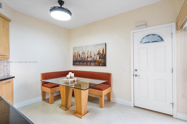 view of tiled dining area