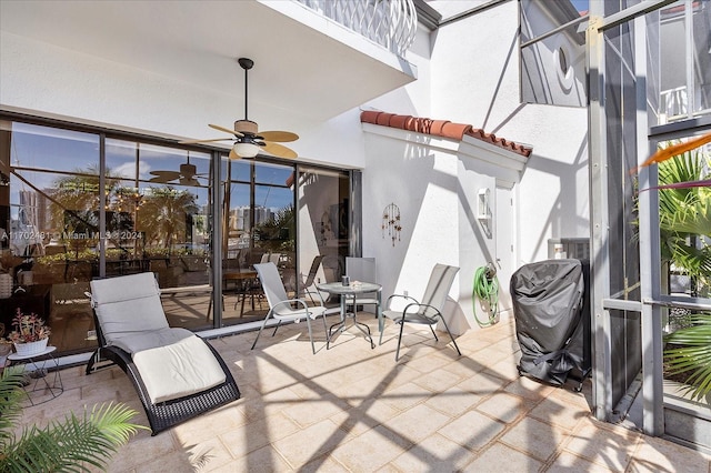 view of patio / terrace with ceiling fan