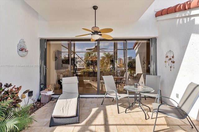 view of patio with ceiling fan