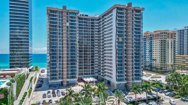 view of building exterior with a water view