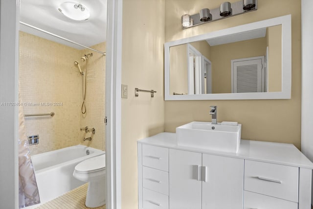 full bathroom with tile patterned flooring, vanity, toilet, and shower / bath combo with shower curtain