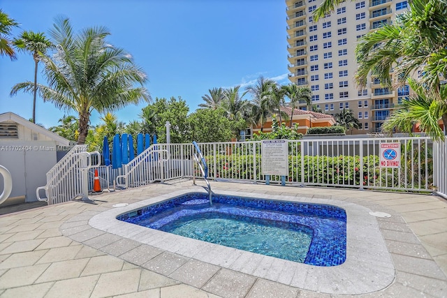 view of pool featuring a community hot tub