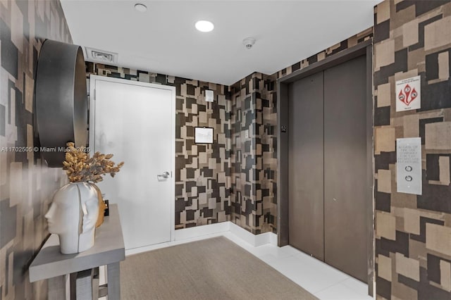 900 Biscayne Blvd Unit 5208, Miami, FL 33132 - bathroom featuring elevator, recessed lighting, tile patterned flooring, and wallpapered walls