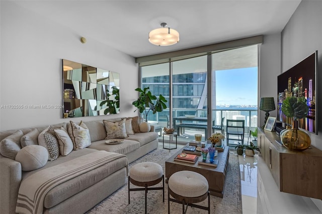 tiled living room featuring expansive windows