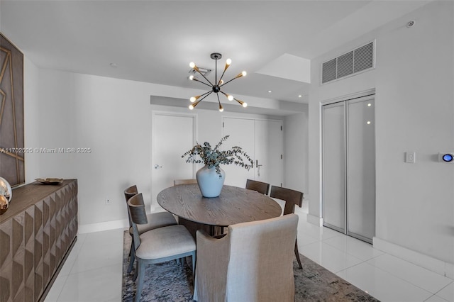 900 Biscayne Blvd Unit 5208, Miami, FL 33132 - dining area featuring a chandelier and light tile patterned flooring
