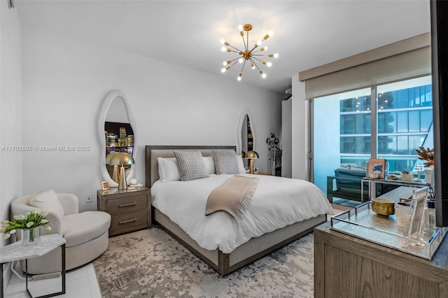 900 Biscayne Blvd Unit 5208, Miami, FL 33132 - bedroom with a chandelier, access to outside, and arched walkways