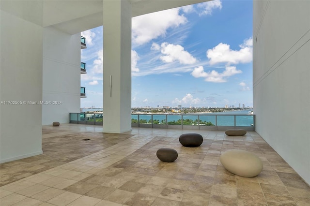 view of patio / terrace with a water view