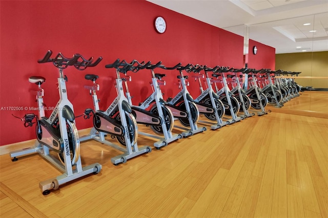 900 Biscayne Blvd Unit 5208, Miami, FL 33132 - workout area featuring wood finished floors and a tray ceiling