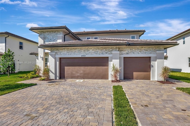 view of front of house with a garage