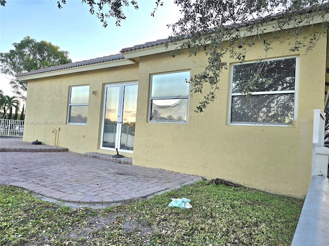 rear view of house with a patio area