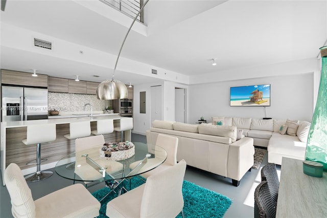 dining area featuring sink