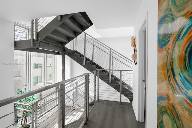 stairway with wood-type flooring