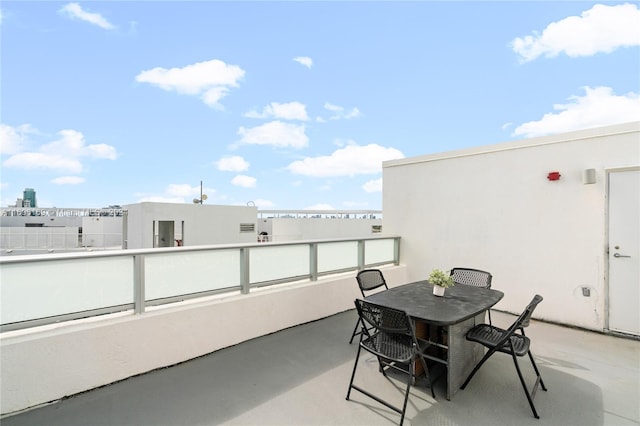 view of patio / terrace with a balcony