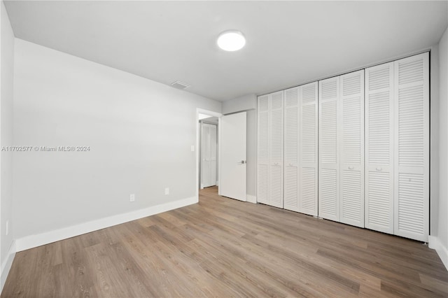 unfurnished bedroom featuring light hardwood / wood-style flooring