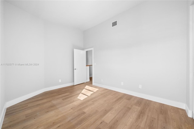 unfurnished room featuring light wood-type flooring