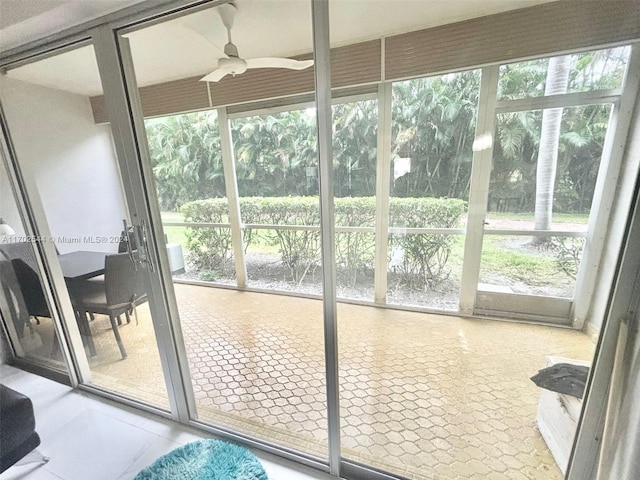 entryway featuring tile patterned floors and plenty of natural light