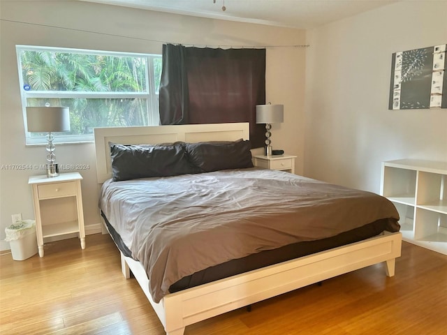 bedroom with light hardwood / wood-style floors