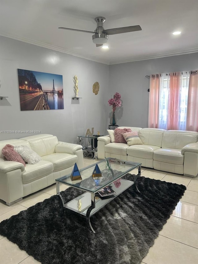 tiled living room featuring ceiling fan and crown molding