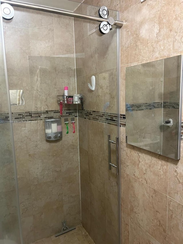 bathroom featuring walk in shower