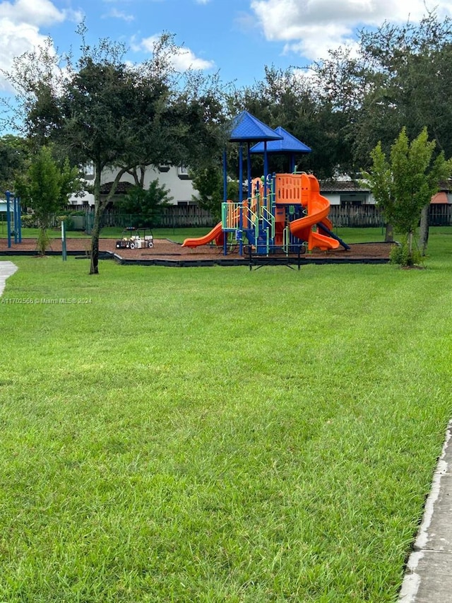 view of jungle gym with a yard