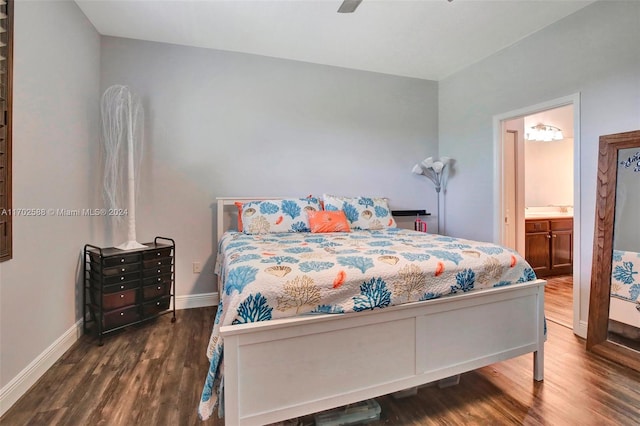 bedroom featuring connected bathroom, ceiling fan, and dark wood-type flooring